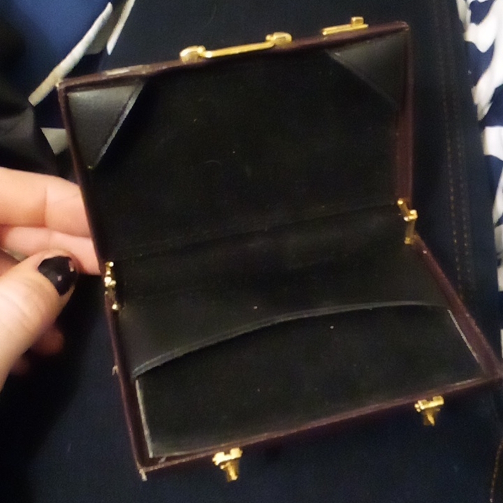 Small suitcase . One of the clips are broken.
